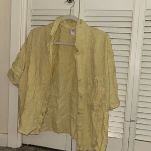 yellow button up plan shirt